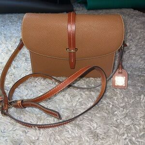 The Dooney & Bourke Pebble Grain Flap Crossbody in Tan Leather